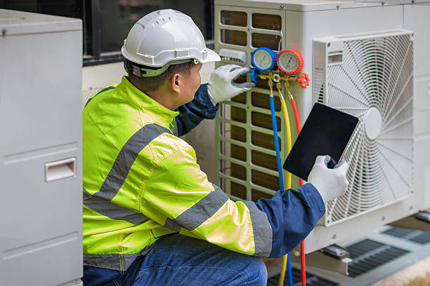 Professional Air Conditioning Repair technician working in Greenfield Center, NY